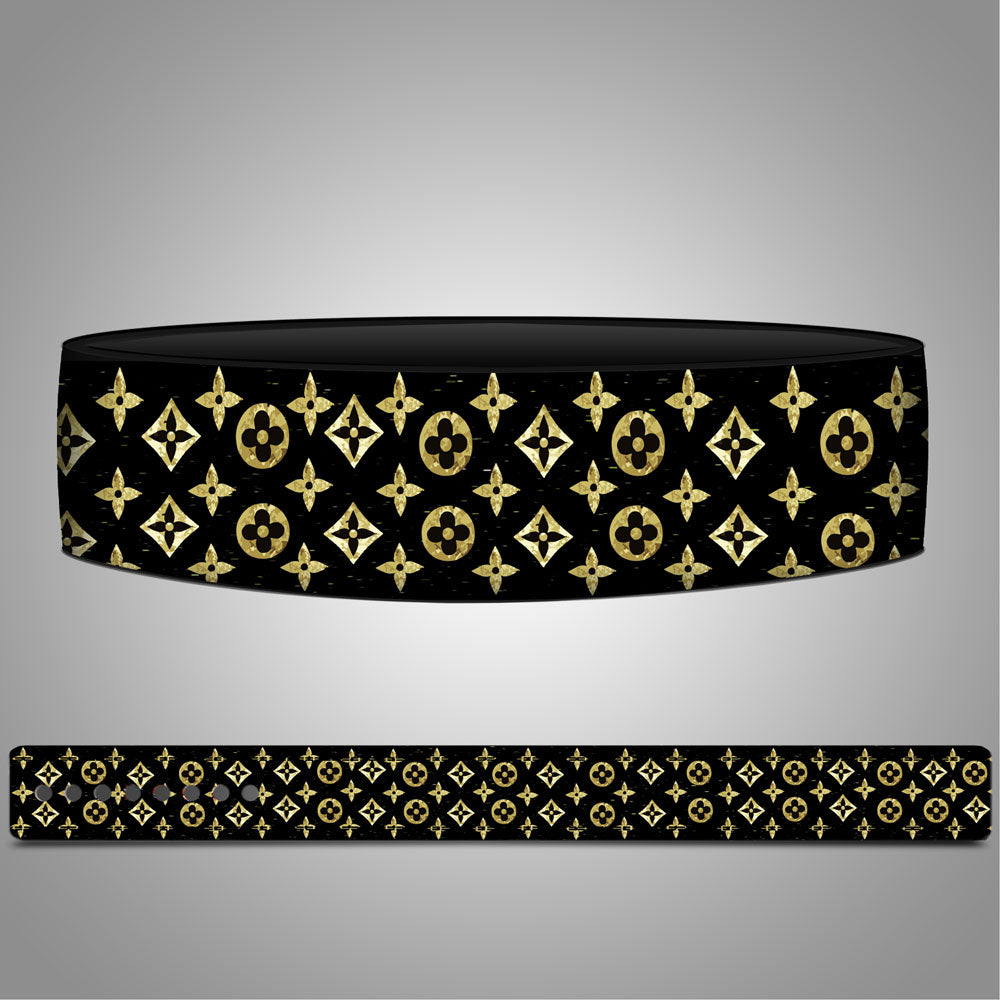 Black headband with gold pattern on a gray background Gold Luxe Weightlifting Lever Belt
