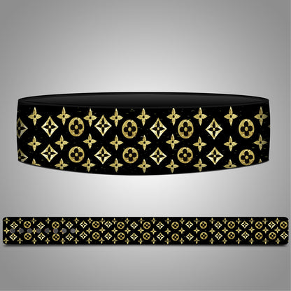 Black headband with gold pattern on a gray background Gold Luxe Weightlifting Lever Belt