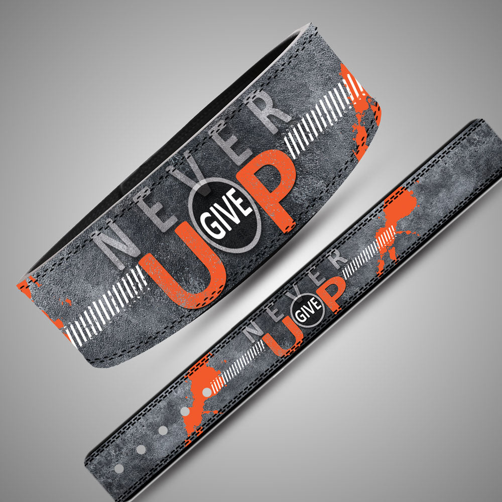 Panoramic view of Never Give Up weightlifting belt strap showing industrial concrete background and orange text