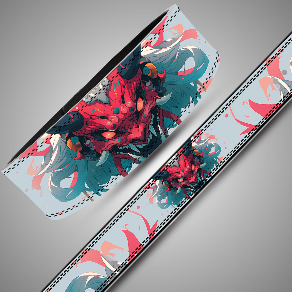 Close-up of the Oni Demon lifting belt artwork with a red horned Japanese mask, teal hair and black double stitching
