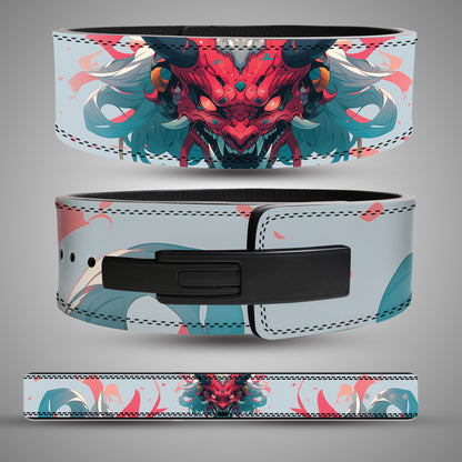 Oni Demon leather weightlifting belt showing red Japanese mask artwork, teal details, black lever buckle and full strap