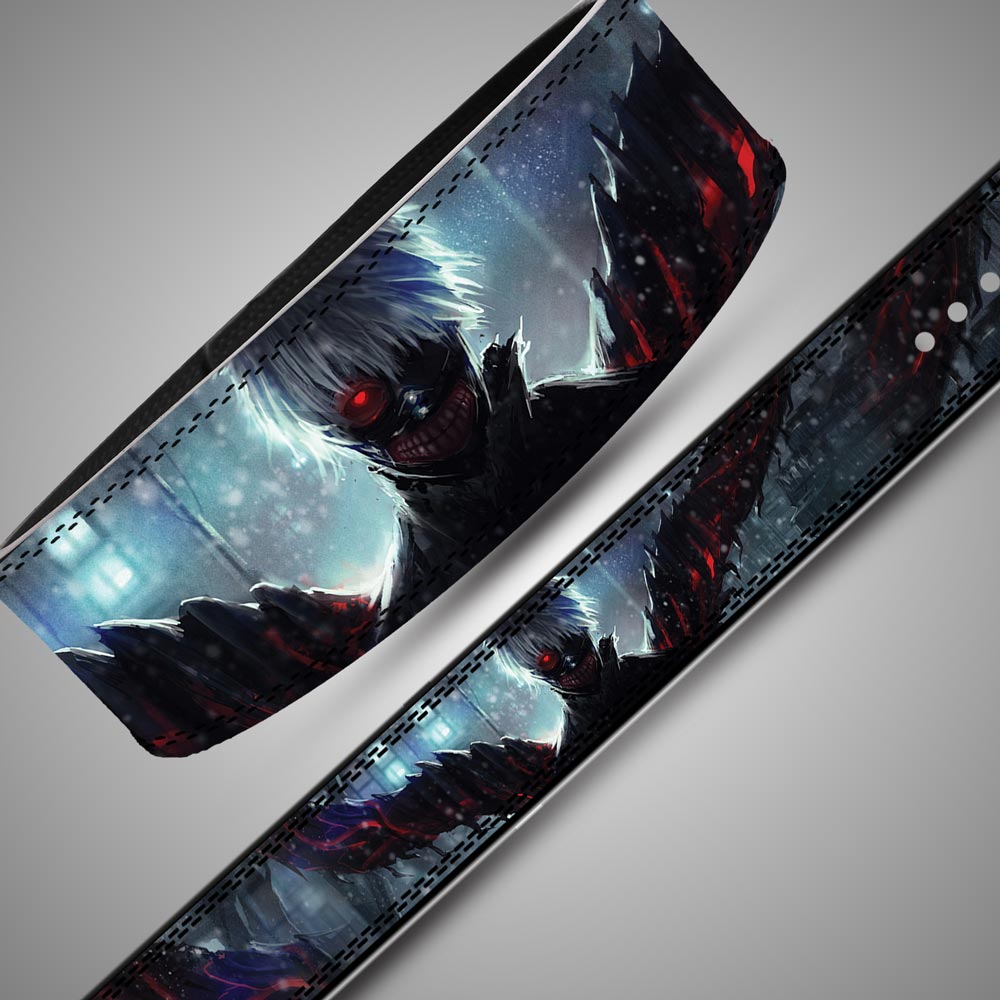 Angled close-up of a Tokyo Ghoul weightlifting belt featuring Ken Kaneki with a glowing red eye, grinning mask, and dark double stitching.
